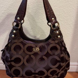 Coach shoulder bag with signature jacquard logo, dark brown with purple interior